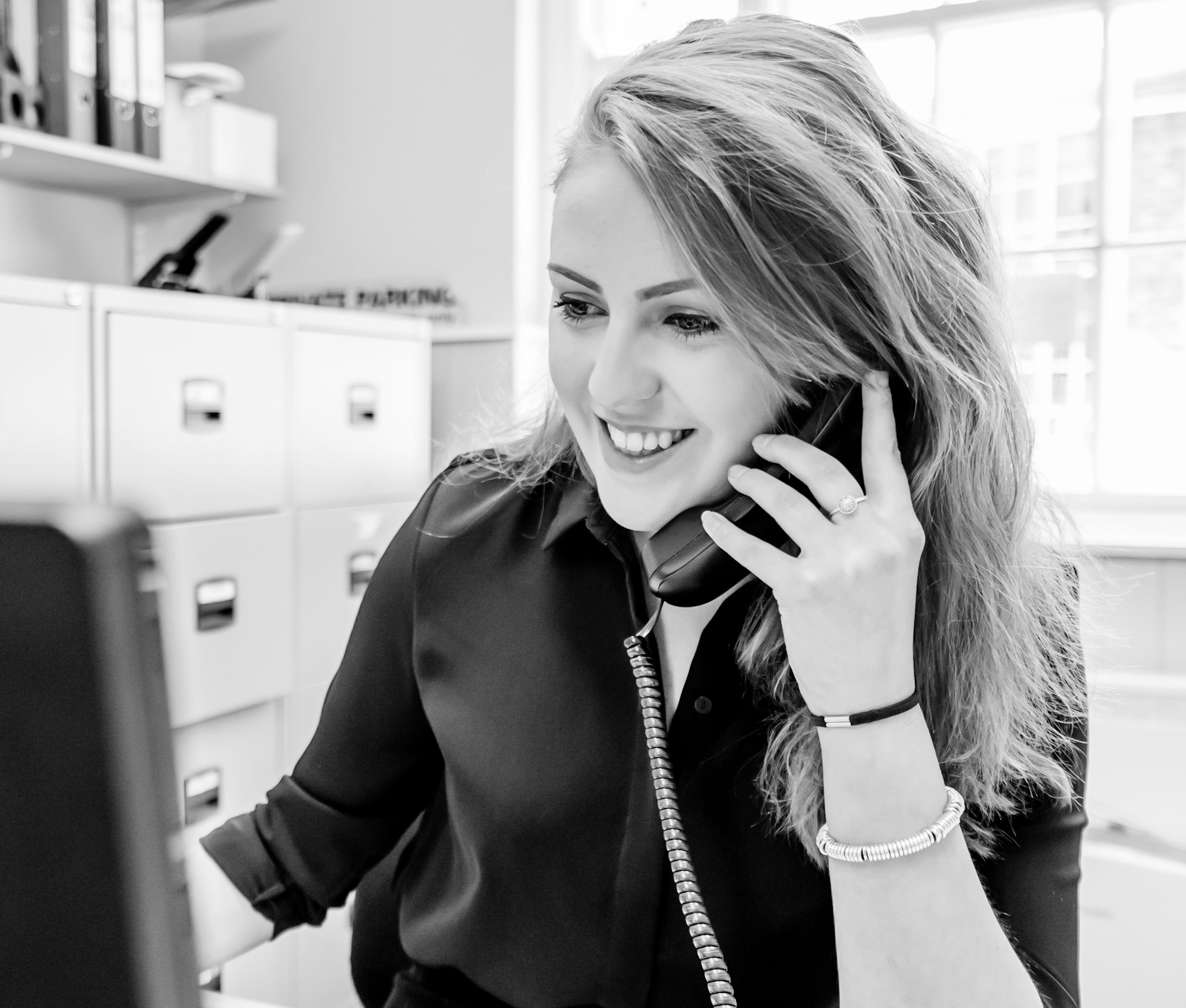  A member of the team at Ashtons on the phone to a customer 